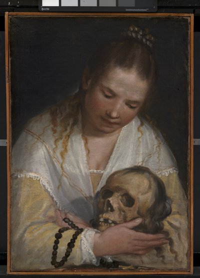 Una joven contemplando un cráneo de Alessandro Casolani