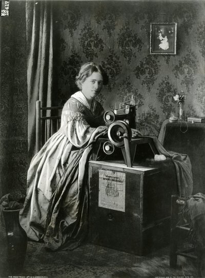 Anuncio de las máquinas de coser patentadas Singer, 1899 de American Photographer