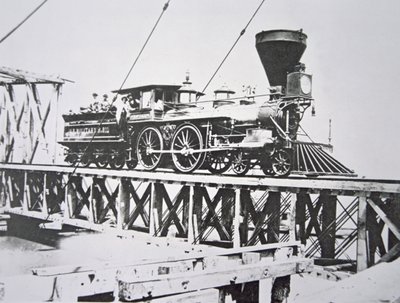 Locomotora de los Ferrocarriles Militares de EE.UU. (Ejército de la Unión) cruzando puente de caballetes sobre el río Potomac de American Photographer