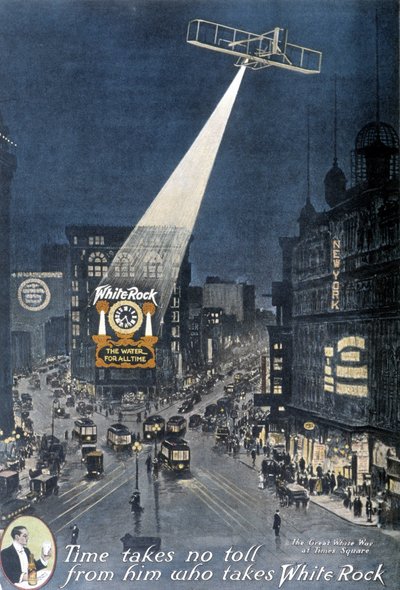 Publicidad de alcohol "White Rock": Un avión iluminando el cartel de "White Rock" colgado en un edificio en Times Square en Nueva York. 1912. de American School