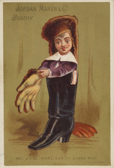 Niño de pie en bota de adulto de American School