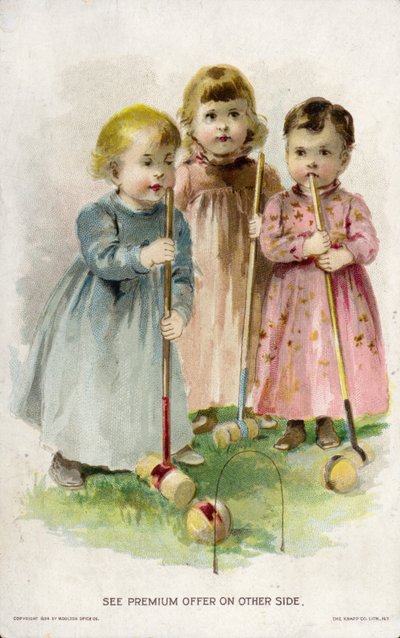 Niños jugando al croquet de American School