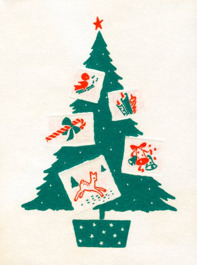 Árbol de Navidad decorado con tarjetas de Navidad de American School