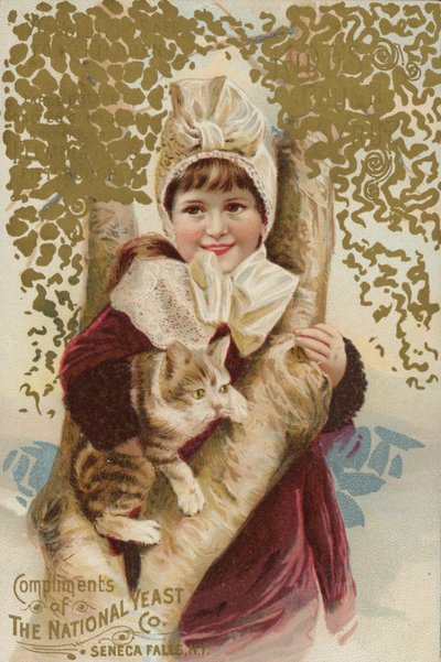 Niña abrazando a un gato junto a un árbol de American School