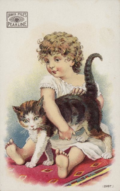 Niña jugando con un gato en la alfombra de American School