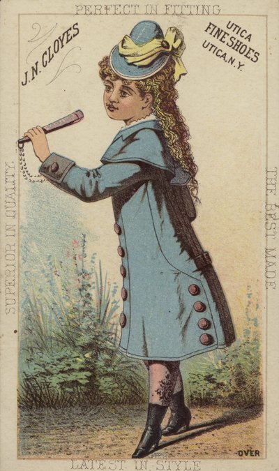 Niña con abrigo y botas azules de American School