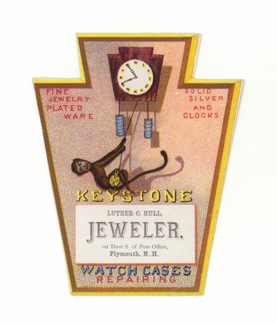 Mono columpiándose en un reloj de American School