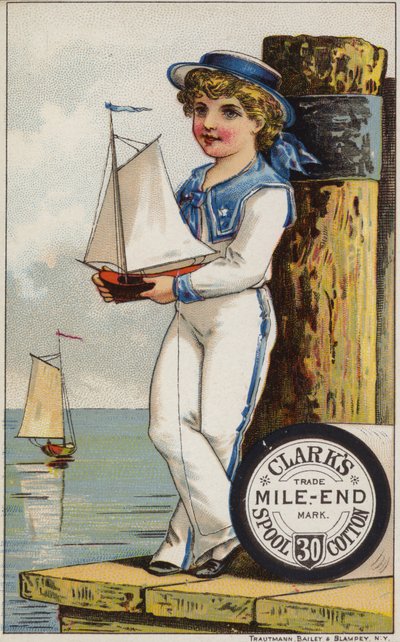 Niño marinero con yate de American School