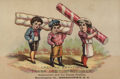 Tres niños llevando confitería de American School