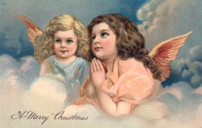 Dos ángeles de Navidad rezando de American School
