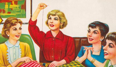 Mujeres en un círculo de costura de American School