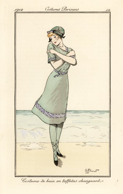 Mujer en la playa en traje de baño de tafetán bicolor de Andre Pecoud
