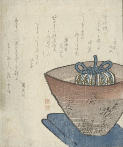 Cuenco de agua con lata de té envuelta de Anonymous