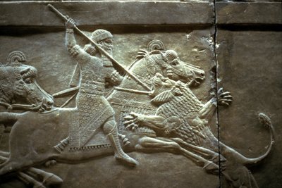 El rey Asurnasirpal II durante una cacería real de leones, 650-620 a.C. de Assyrian