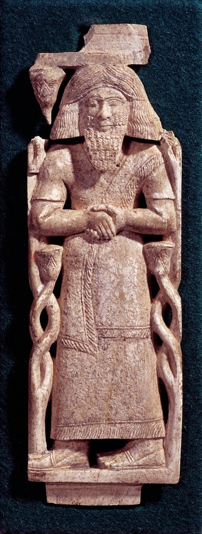Antigüedad oriental: personaje barbudo con cabello largo, tallado en una lámina de marfil. Siglo VIII-VII a.C. Arslan Tash de Siria. París, museo del Louvre de Assyrian
