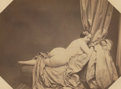 Desnudo académico, recostado en un sofá, c. 1855 de Auguste Belloc