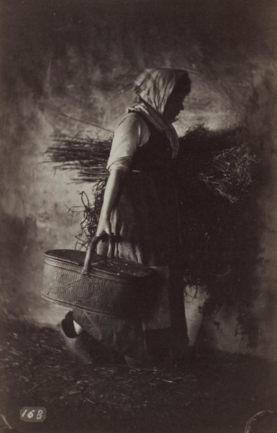 Campesina llevando una cesta y heno, c. 1870 de Auguste Giraudon