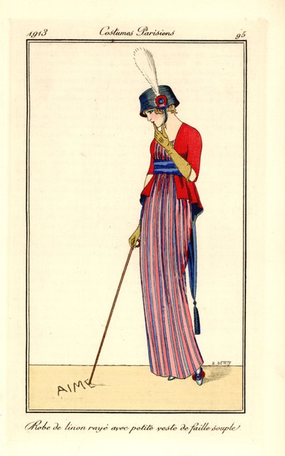 Mujer con vestido de lino a rayas y chaleco de suave seda acanalada o faille, sombrero con escarapela. Escribe amor con su bastón en la arena. Robe de linon raye avec petite veste de faille souple. Grabado pochoir (stencil) coloreado a mano según una ilust de B Berty