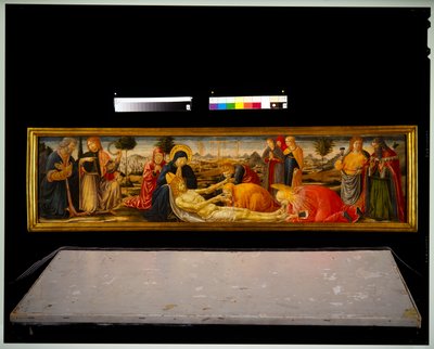 Panel Predella - Lamentación con dos santos varones que presentan a dos demonios varones de Benozzo di Lese di Sandro Gozzoli