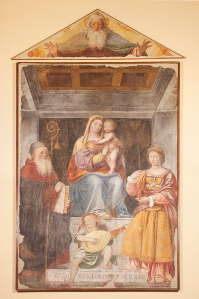 Madonna y el niño, San Antonio el Grande, Santa Bárbara y ángel músico de Bernardino Luini