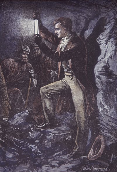 Humphry Davy con la lámpara de seguridad Davy para mineros, inventada en 1815 (grabado en madera coloreado a mano) de British School