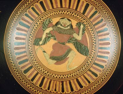 Copa de figuras negras áticas decorada con una gorgona corriendo de C Painter