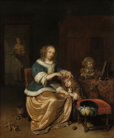 Interior con una madre peinando el cabello de su hijo, conocido como 