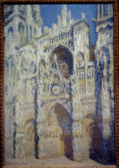 La catedral de Rouen, el portal y la torre Saint Romain, pleno sol armonía azul y dorado de Claude Monet