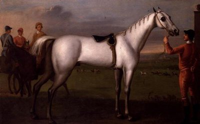 Mozo sosteniendo un caballo de carreras gris de D. Quigley
