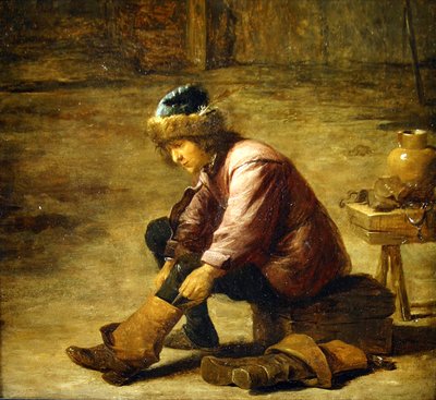 Un joven poniéndose una bota de David Teniers the Younger
