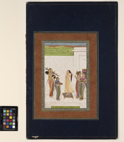 Una mujer completando su tocador, c.1725 de Deccani School