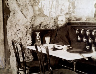 Verlaine en un bistró bebiendo absenta de Dornac