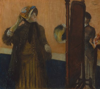 En la Modista, 1882 de Edgar Degas
