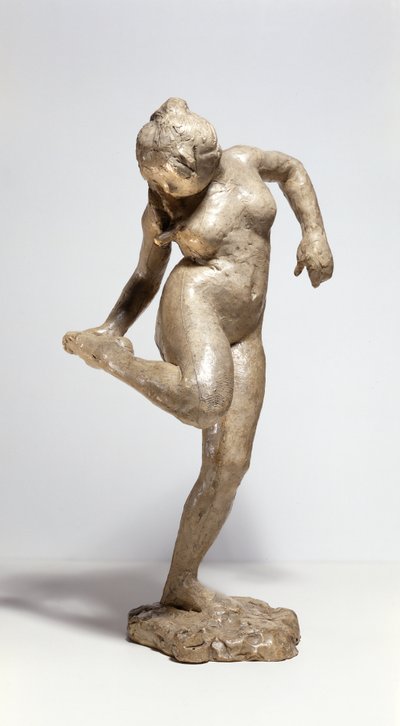 Bailarina mirando la planta de su pie de Edgar Degas