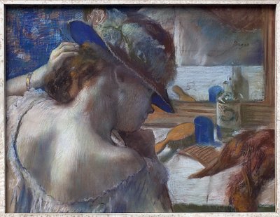 Frente al espejo de Edgar Degas