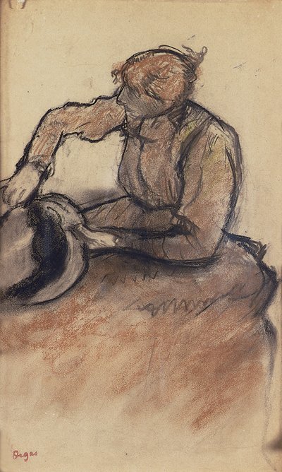 Modista adornando un sombrero, c.1898 de Edgar Degas
