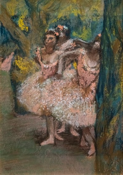 Tres bailarinas con faldas de color salmón de Edgar Degas
