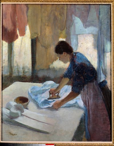 Mujer planchando a contraluz de Edgar Degas