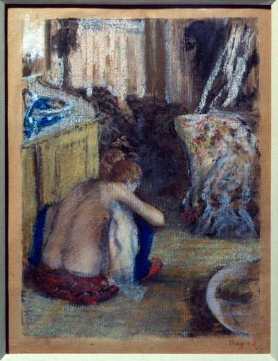 Mujer en cuclillas de Edgar Degas