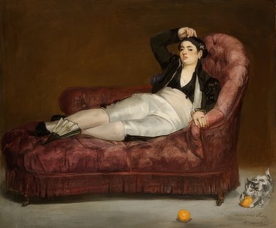 Mujer joven acostada con traje español de Édouard Manet