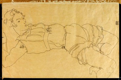 Joven mujer acostada de espaldas, 1915 de Egon Schiele