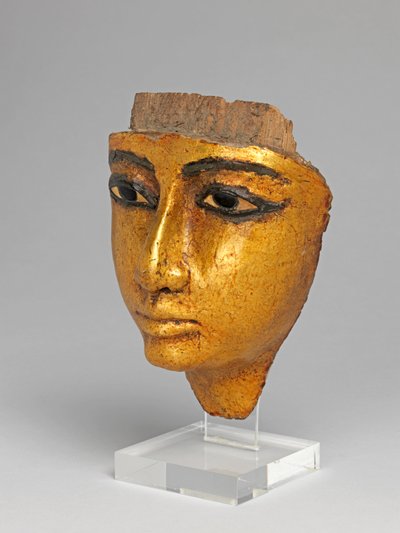 Rostro de un ataúd, con ojos y cejas incrustados, dorado de Egyptian 20th Dynasty