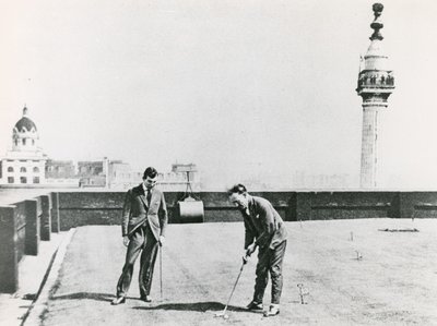 Golfistas de la ciudad vistos desde el Monumento de English Photographer