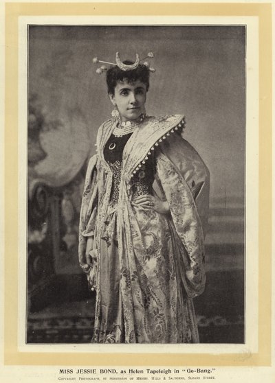 Señorita Jessie Bond, como Helen Tapeleigh en Go-Bang de English Photographer