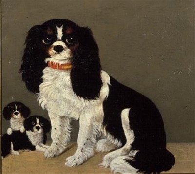 Un Cavalier King Charles Spaniel con cachorros de English School