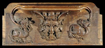 Una misericordia que representa tres rostros humanos flanqueados por monstruos, Capilla del New College, Oxford, finales del siglo XIV (madera) de English School
