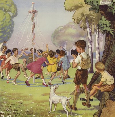 Niño filmando a niños bailando alrededor de un palo de mayo de English School