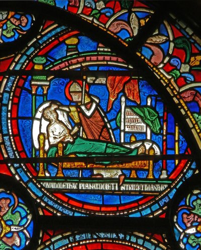 (detalle) de la Ventana del Milagro que representa a San Tomás visitando a un hombre enfermo en su sueño de English School