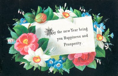 Corona de flores con tarjeta de English School