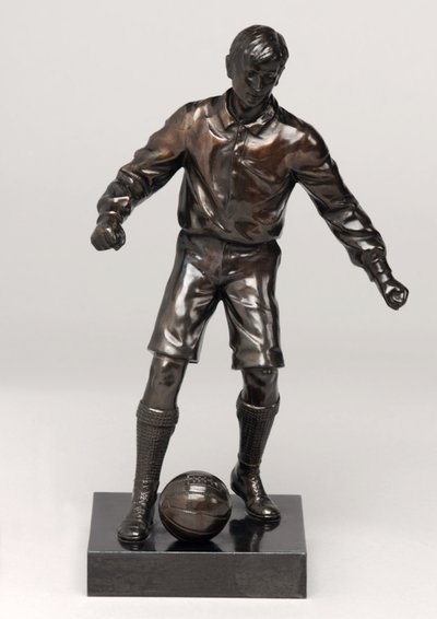Futbolista, parte de un conjunto de reloj de English School